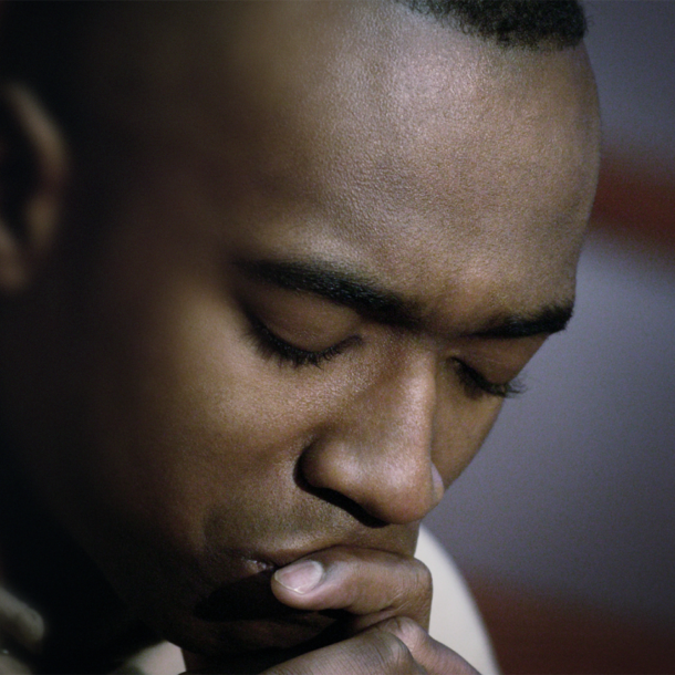 black man praying